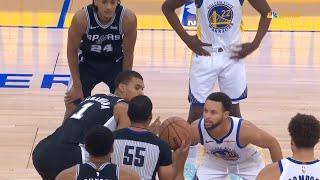 Stephen Curry vs Victor Wembanyama jump ball at start of Warriors vs Spurs 