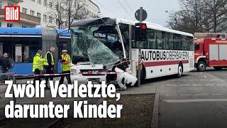 MÜNCHEN: Schulbus kracht in Tram