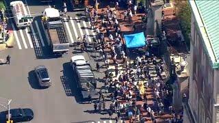 Protesters demonstrate outside Columbia University as classes resume