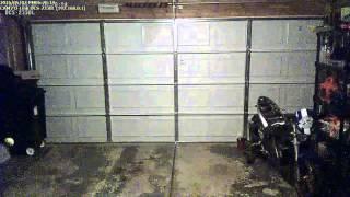 garage door tension spring breaks on security camera