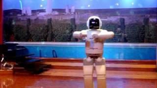 ASIMO robot dances inside of Disney's Inoventions