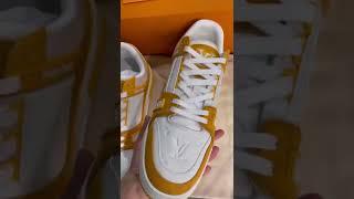 LV trainer shoes yellow