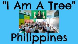Students from The Philippines recite "I Am A  Tree"
