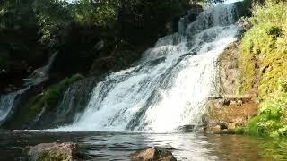 Power of Water. In the center of the biggest waterfall in Ukraine