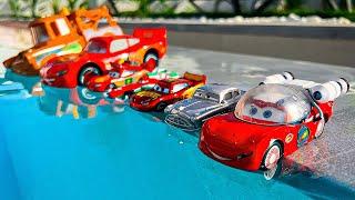 Disney Pixar Cars falling into deep pool, Lightning McQueen, Tow Mater, Mack, Sally, Francesco