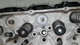 Setting valve spring installed height