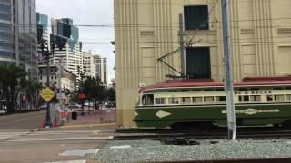 Vintage Trolley in San Diego passing Santa Fe Depot