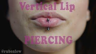 Vertical Lip Piercing by Ruben Lew