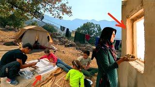 A window facing the sky: Akram installs the window of her house