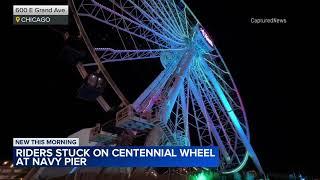 Riders stuck on Centennial Wheel at Navy Park