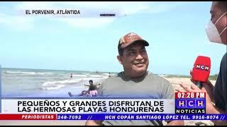 Familias disfrutan de las cálidas playas en El Porvenir, Atlántida