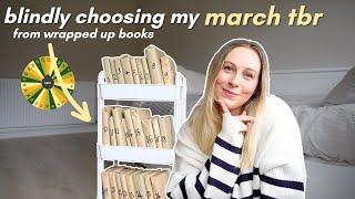 blindly choosing my march tbr with a random number generator  *wrapped up books*