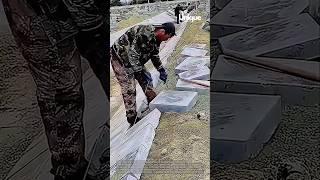 Laying concrete slabs: people laying concrete slabs