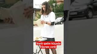 İranlı qadın küçədə Quranı cırdı