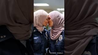 Two policewoman with HIJAB KISSING with passion ️