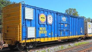 CSX Mixed Freight Train Carrying Safety Training Cars