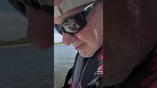 How to keep HAT from Flying out boat!             #cajun #funny #boat #macgyver