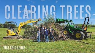 Clearing Trees With an Excavator & Family! - (HUGE burn Pile Fire)