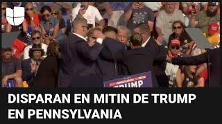 El momento en que disparan mientras Trump daba su discurso en el mitin en Pennsylvania