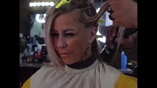 Woman gets a Side Shave Haircut in Barbershop