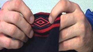 Видеообзор  ШАПКИ UMBRO STRIPE LOGO BEANiE  560314 560414 Интернет Магазин ВЕРШИНА СПОРТА