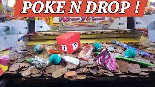 GIVE IT A POKE AND WATCH IT DROP! 2p pushers uk arcade amusements we try poke n drop, claw machines