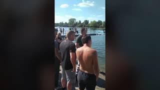 Fuming mum confronts shirtless men riding ponies as they dive into lido