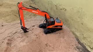 Huina long arm Excavator digging earth playing alone|P-KH RC