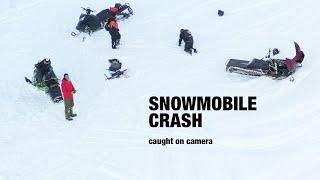 Snowmobile crash caught on camera. Epic snowmobile fail.