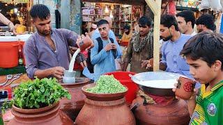 Afghani man selling Matka Lassi | Only 50 Rupees Per Glass | Most Viral Lassi in Peshawar Pakistan