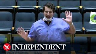 YouTuber dressed in scrubs performs Covid vaccine rap at council meeting