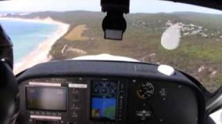 JABIRU 230D AIRCRAFT ; LAND ALONGSIDE THE BEACH ON FRASER ISLAND, AUSTRALIA