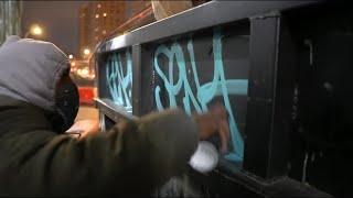 SEN4 painting Graffiti in New York City: Lower East Side..