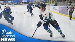 Trondek Hwëch'in player getting ready for puck to drop at World Juniors | APTN News