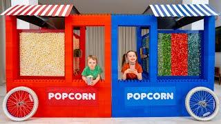 Stephi and Dasha Sell Rainbow Popcorn - Stand Adventure by Vania Mania Kids