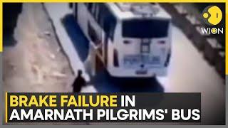 Amarnath Yatra bus' brakes fail: Passengers jump out of moving vehicle in panic | WION