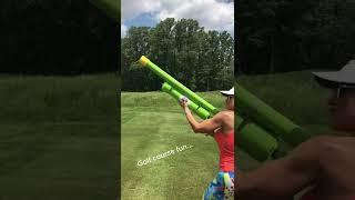 Gorgeous Lisa Ann shooting airgun in golf course