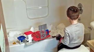 Child Playing with Snow in the Bath Tub