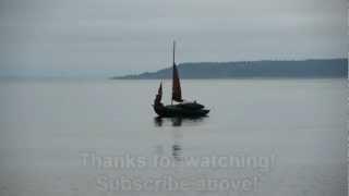 Dark Sailboat in front of Powell River