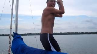 Clay swinging off the boat
