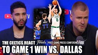 The Boston Celtics react to their Game 1 win over the Dallas Mavericks in the NBA Finals