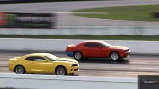 Challenger SRT 8 6.1 L vs Camaro SS 6 speed- Drag Race Video - Road Test TV ®