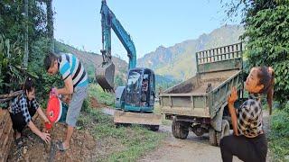 Driver and girl maintenance, change engine oil for excavator and truck.