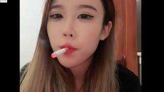 Chinese girl WANG smoking & chatting with netizens at home 154