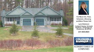 12121 Cottage Lane The Enclave Unit 8, Charlevoix, MI Presented by Lynn Robinson.