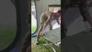 Set up an Army cot in 60 seconds.