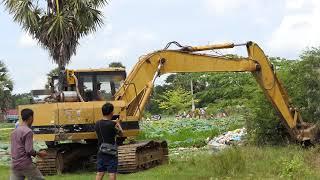 Amazing Excavator Unloading Dirt Mud