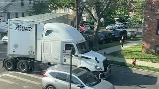 truck making tight turn on residential street pt 3