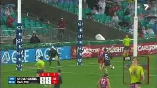 Kurt Tippett shows slick skills in the wet and kicks an awesome snap