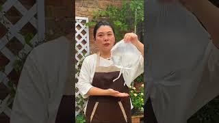 The process of watering flowers and potted plants with a tied water bag